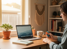 “Bright, realistic home office scene with an adult holding a small tactile sensory fidget beside a laptop, tea mug, and notebook.”