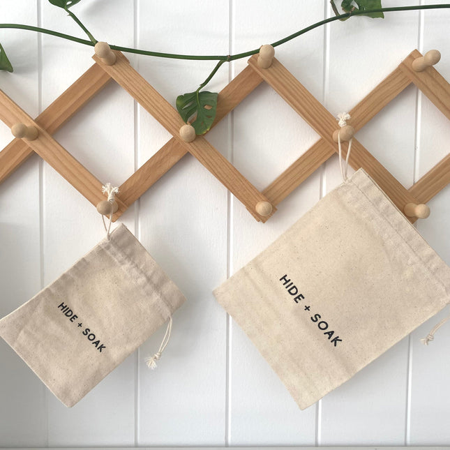 Hide + Soak Cotton Bath Bags – Small & Large | Reusable hanging on wooden rack, helping families thrive with tools to calm, connect and support