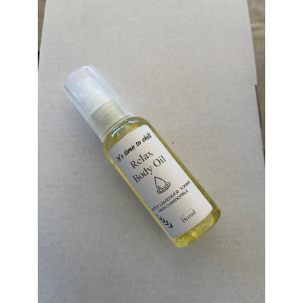 Small bottle of Relax Body Oil Massage and Moisturise with calming lavender and chamomile, helping families thrive.