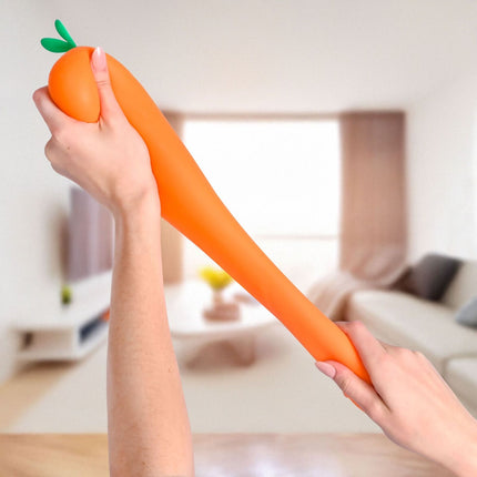 Squishy Jumbo Carrot orange stretchy sensory toy held in hands