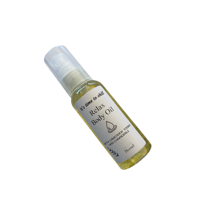 Clear bottle of Relax Body Oil Massage and Moisturise with lavender and chamomile, promoting calm and wellbeing.