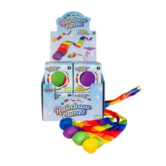 Rainbow Comet colorful sensory fidget with long tail for calming and sensory play, displayed in retail packaging.
