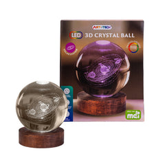 Solar System 3D Crystal Ball Lamp showing illuminated planetary design on wooden base with box packaging behind.