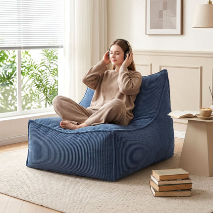 Artiss Bean Bag Chair Cover (No Filler) Soft Corduroy Stuffed Animal Storage Bean Bag Cover for Adults, Washable Lazy Sofa Cover for Living Room Bedroom, Blue with woman relaxing and listening to headphones
