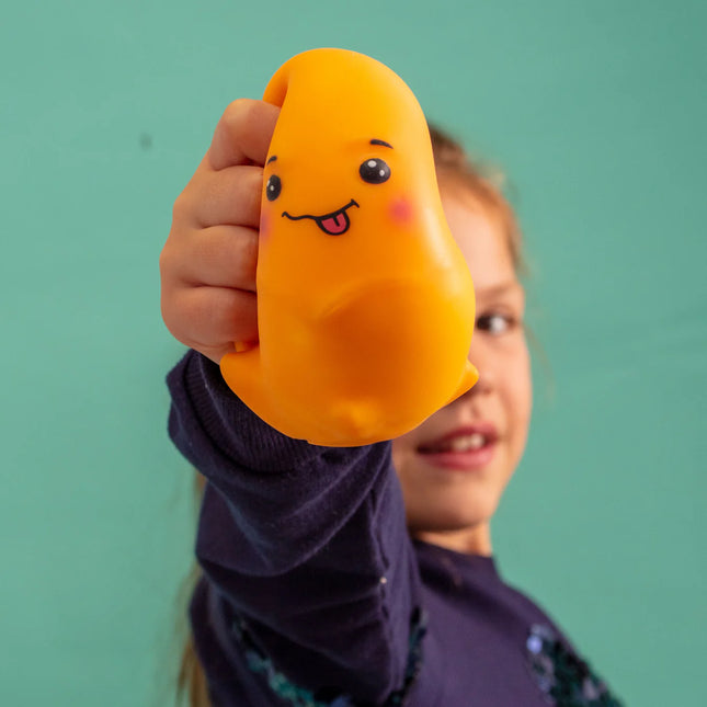 Child squeezing an orange Stress Toy - Jellysquish with a playful face, promoting calm and sensory relief.