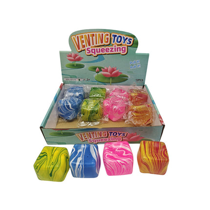 Open display box with four colorful swirled squishy toys in green blue pink and orange