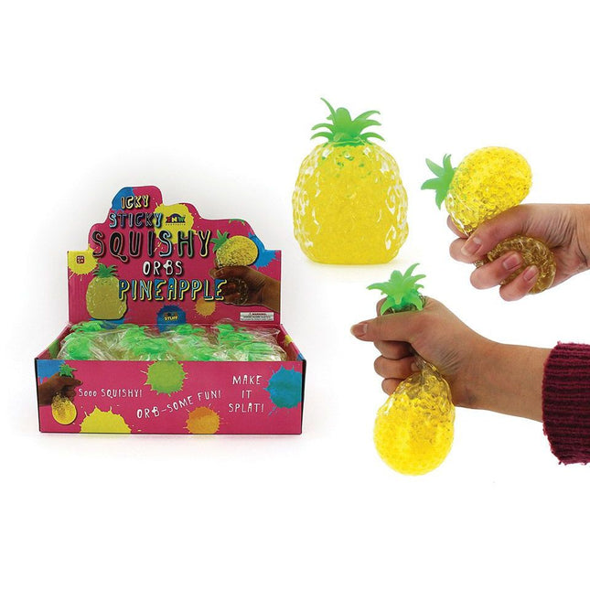 Squishy Water Orbs Pineapple fidget toy being squeezed, with yellow textured orbs and green leafy top details.
