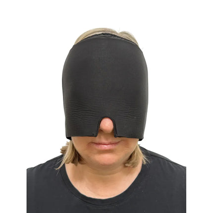 Person wearing the Block Out Cooling Head Mask – a cool ‘hug’ for your head, black sensory mask covering eyes and nose.