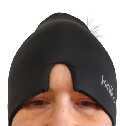 Person wearing a black Block Out Cooling Head Mask – a cool ‘hug’ for your head covering forehead and eyes.