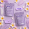 Breathe Bundle (with slit) nasal strips and mouth tape with slit in calming purple, surrounded by soft petals and feathers.