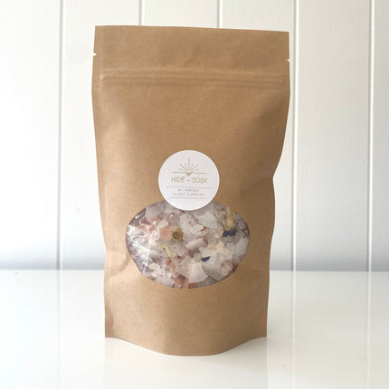 Brown resealable pouch with floral salt crystals inside labeled #3 Indigo - Sleep Support - Magnesium Bath + Foot Salts