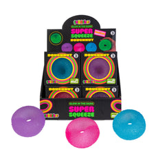 Smoosho's Super Squeeze Glow-in-the-dark Doughnut fidget toys in purple, pink, and blue for sensory play and stress relief