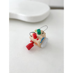 Busy Block wooden sensory toy with colorful knobs and wires, helping families thrive with tools to calm, connect and support