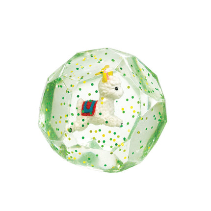 Smooshos Super Squeeze Diamond Sphere GID Alpaca with small alpaca figure inside clear faceted squishy sphere with green dots
