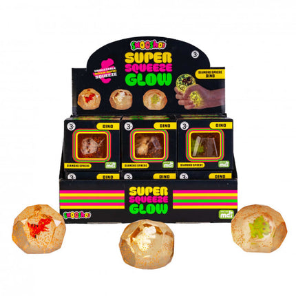 Display box of Smooshos Super Squeeze Diamond Sphere GID Dino sensory squishies with three spheres glowing inside and out