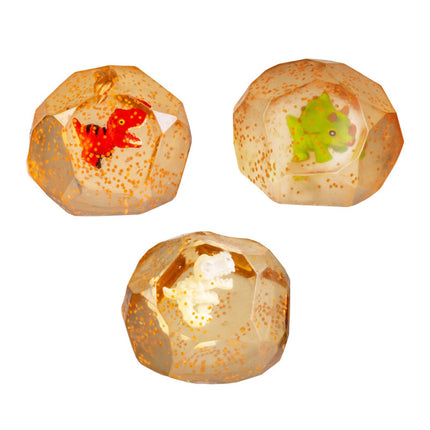 Three Smooshos Super Squeeze Diamond Sphere GID Dino squishies with colorful dinosaur figures inside and glitter accents.