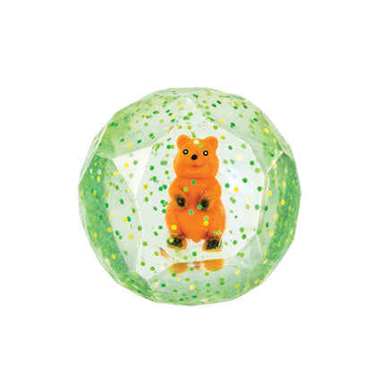 Smooshos Super Squeeze Diamond Sphere GID Quokka, a clear sphere with green sparkles and an orange quokka inside.