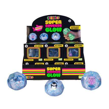 Display of Smooshos Super Squeeze Diamond Sphere GID Sea Animal squishies with glowing sea creature designs inside spheres.
