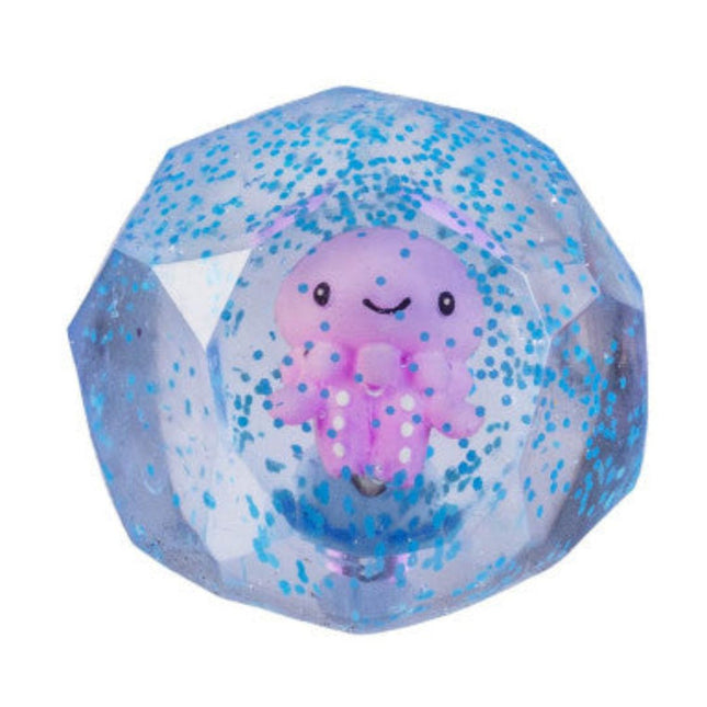 Smooshos Super Squeeze Diamond Sphere GID Sea Animal with a smiling purple octopus inside a clear glittery sphere squishy toy