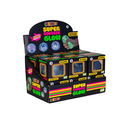 Display box of Smooshos Super Squeeze Diamond Sphere GID Sea Animal sensory squishies glowing in green and blue colors.