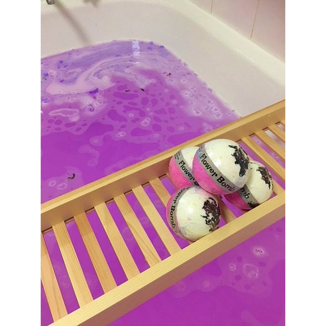 Flower Bomb Bubble Bath Bomb in Pink Lychee and Rose Petals Set of 6 with purple bath water, helping families thrive with tools to calm connect and support