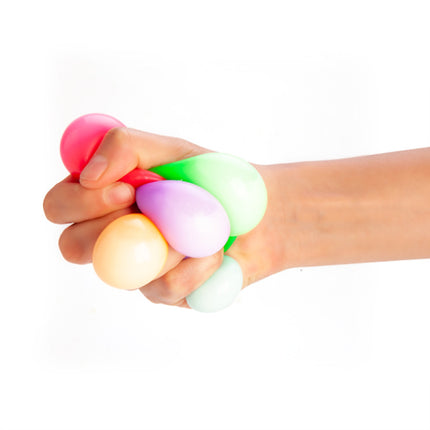 Hand squeezing colorful Smoosho's Sticky Splat Ballz - Set of 3 sensory squishy fidget toys for stress relief