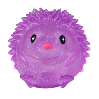 Smoosho's Super Squeeze Glow-in-the-dark Echidna purple squishy fidget toy with glitter for sensory play and calming.
