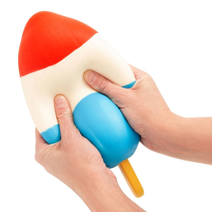 The Big Squij Rocket Pop sensory squishy toy being squeezed by hands