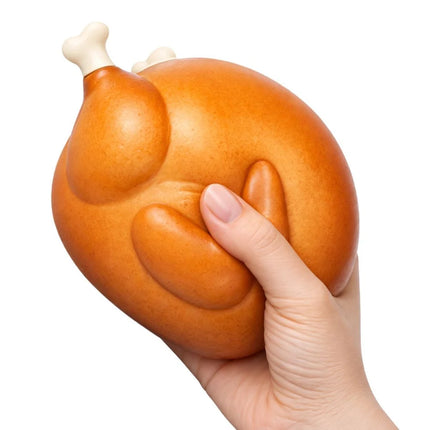 The Big Squij Turkey Slow-Rise Squishy Toy held in a hand