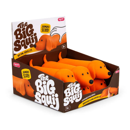 The Big Squij Dachshund Slow-Rise Squishy Toy in an orange retail display box