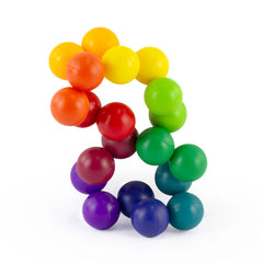 Rainbow Fidget made of colorful connected spheres in a flexible, twistable design for sensory and calming use.