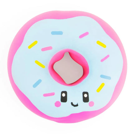 Pink and blue donut character with sprinkles a smiling face and a central hole