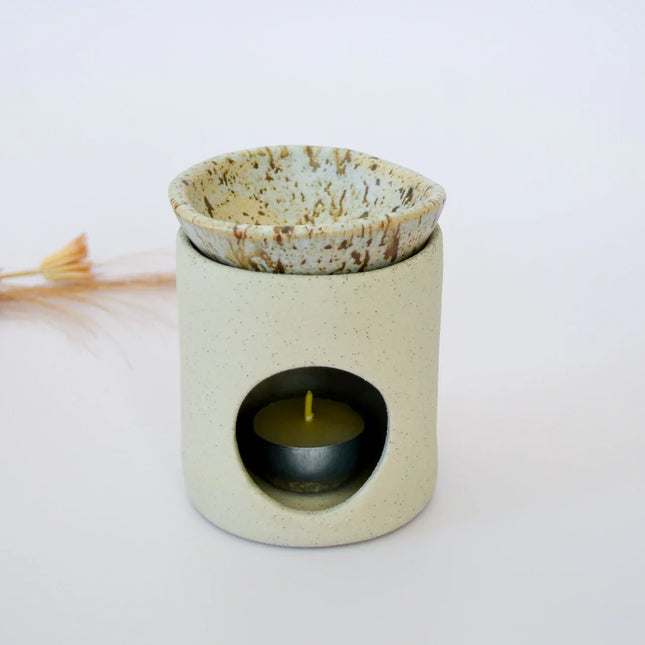 Kim Wallace Ceramic Soy Melter / Oil Burner in neutral tones with speckled top, designed to calm and support families.