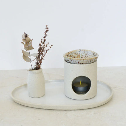 Kim Wallace Ceramic Soy Melter / Oil Burner with dried flowers on a tray, helping families thrive with tools to calm, connect and support
