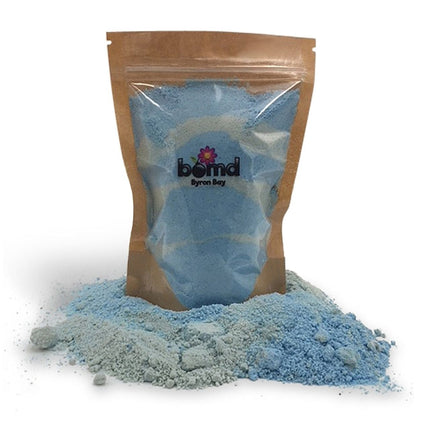 Mermaid Kisses Fizzing Bubble Bath in blue powder form in a brown resealable pouch helping families thrive with tools to calm connect and support