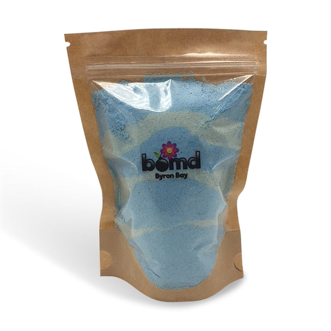 Mermaid Kisses Fizzing Bubble Bath in resealable bag with natural blue powder, helping families thrive with tools to calm, connect and support.