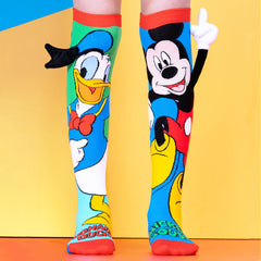 Colorful Donald Duck & Mickey Socks worn on legs with playful cartoon designs on a bright background
