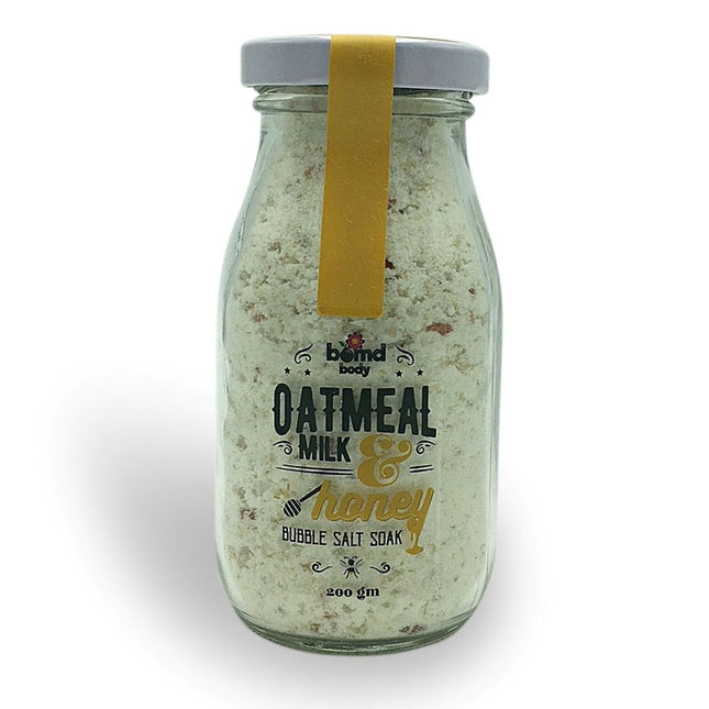 Oatmeal Milk & Honey Moisturising Bubble Salt Soak with Himalayan Rock Salt in clear vintage-style jar, calming care.