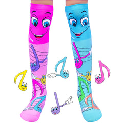 Bright pink and blue Music Notes Socks featuring smiling musical notes, helping families thrive with tools to calm, connect and support.