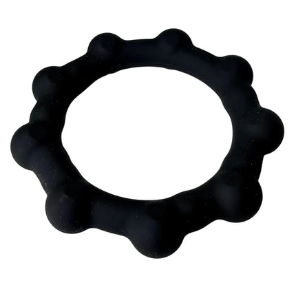 Octopop - Quiet. Wearable. Satisfying black sensory fidget ring with rounded nodules for tactile stimulation.