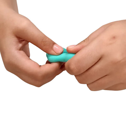 Hands holding and squeezing a turquoise sensory fidget toy, Octopop - Quiet. Wearable. Satisfying.