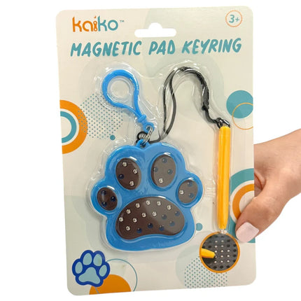 Paw Magnetic Pad Keyring in blue with metal magnetic surface and included yellow magnetic stylus on black cord, displayed in branded packaging.