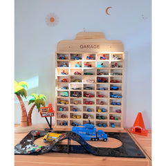 JCAR Garage — 1:64 Diecast Display Rack · 50 Slots with colorful toy cars and racetrack