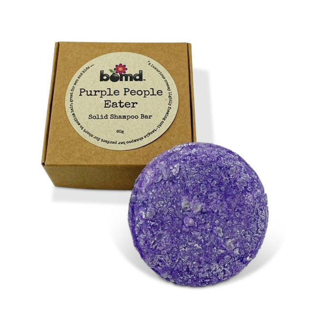 Purple People Eater Solid Shampoo Bar up to 80 Washes with natural ingredients and eco-friendly packaging helping families thrive.