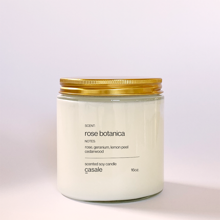 ROSE BOTANICA DOUBLE WICKED SOY CANDLE (16oz / 453g) with gold lid, calming rose and cedarwood scent helping families thrive.