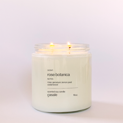 ROSE BOTANICA DOUBLE WICKED SOY CANDLE (16oz / 453g) lit, calming scent with rose, geranium, lemon peel, cedarwood.