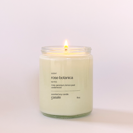 ROSE BOTANICA SINGLE WICKED SOY CANDLE (8oz / 226g) lit, promoting calm, connection, and support for families