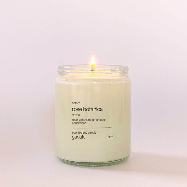 ROSE BOTANICA SINGLE WICKED SOY CANDLE (8oz / 226g) lit, promoting calm, connection, and support for families