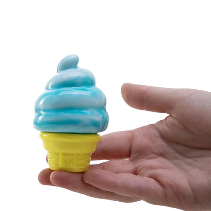 Hand holding a blue and yellow ice cream cone shaped squishy toy