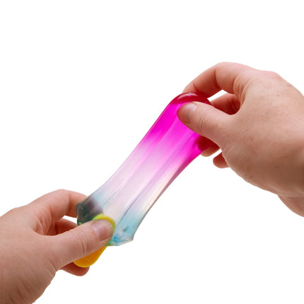 Schylling - Nice-sicle NeeDoh sensory fidget toy stretched between two hands